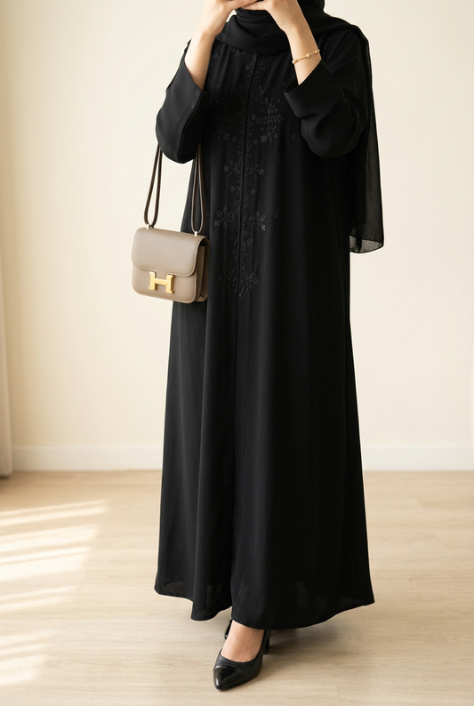 LAYLA in the reference stance with raised hands, a black scarf, and warm ivory background